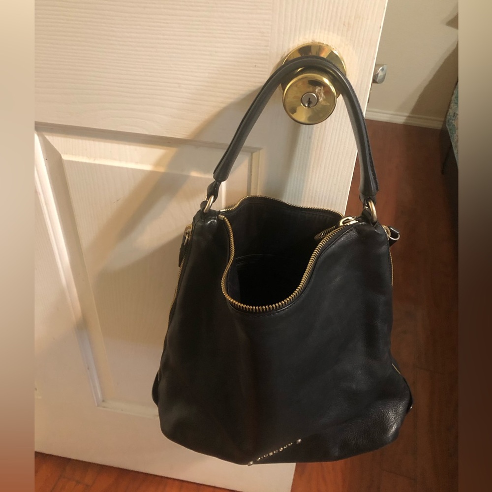 Givenchy bag. Used but well taken care off. Mild wear and tear.